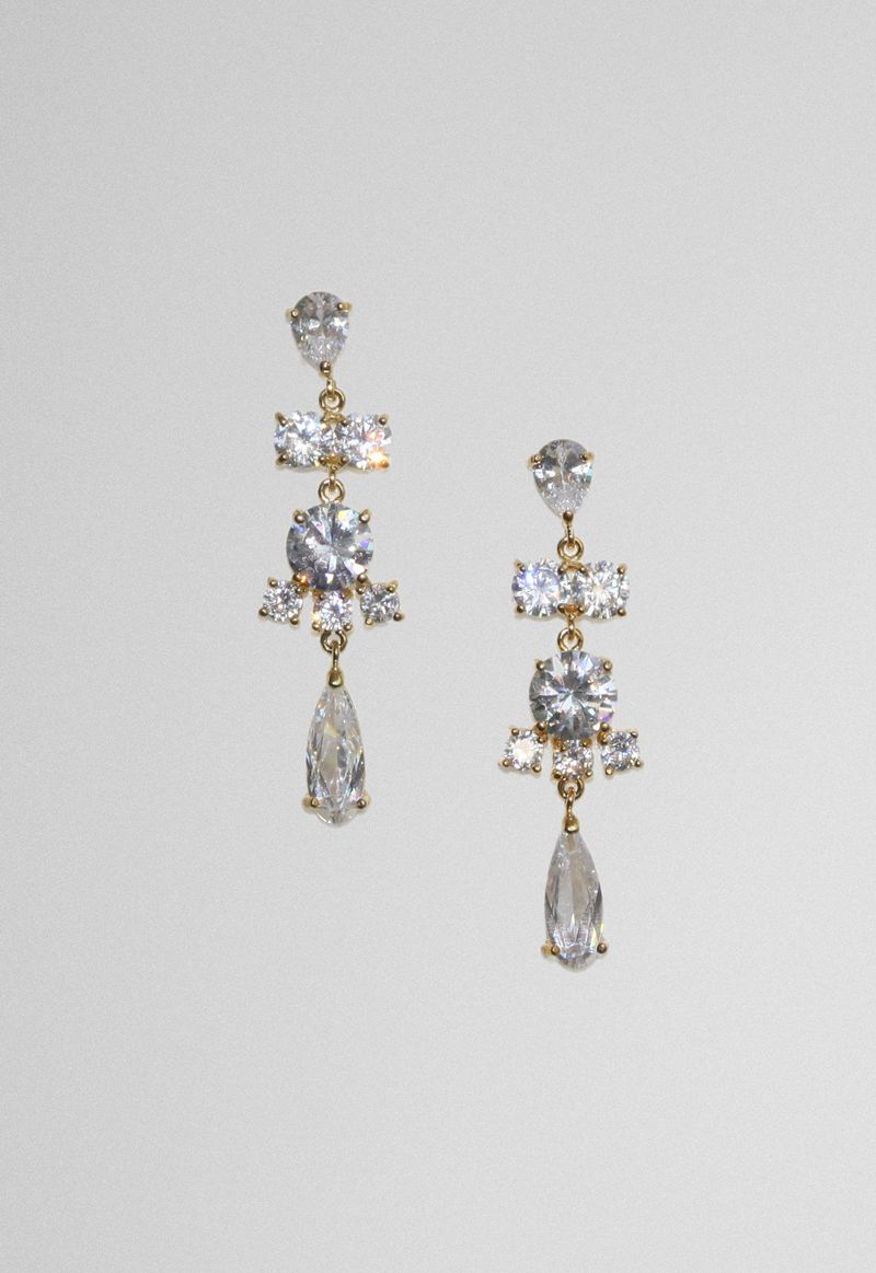brinco-com-pedras-pendentes-de-cristal-com-dourado-powerlook